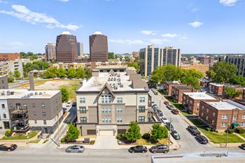 Aerial view of mirabelle apartments and their parking garage entrance.